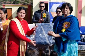 Distributing School Bags- AITYS